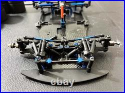 Pièces détachées 1/12 Racing Yokomo R12 avec de nombreux pneus d'occasion